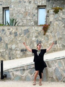 heroine's journey corfu photographer happy pose terrace
