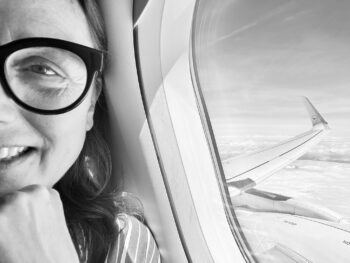heroine's journey corfu photographer sina airplane travel